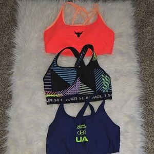 Under Armour Neon Orange, Black, and Blue Sports Bras